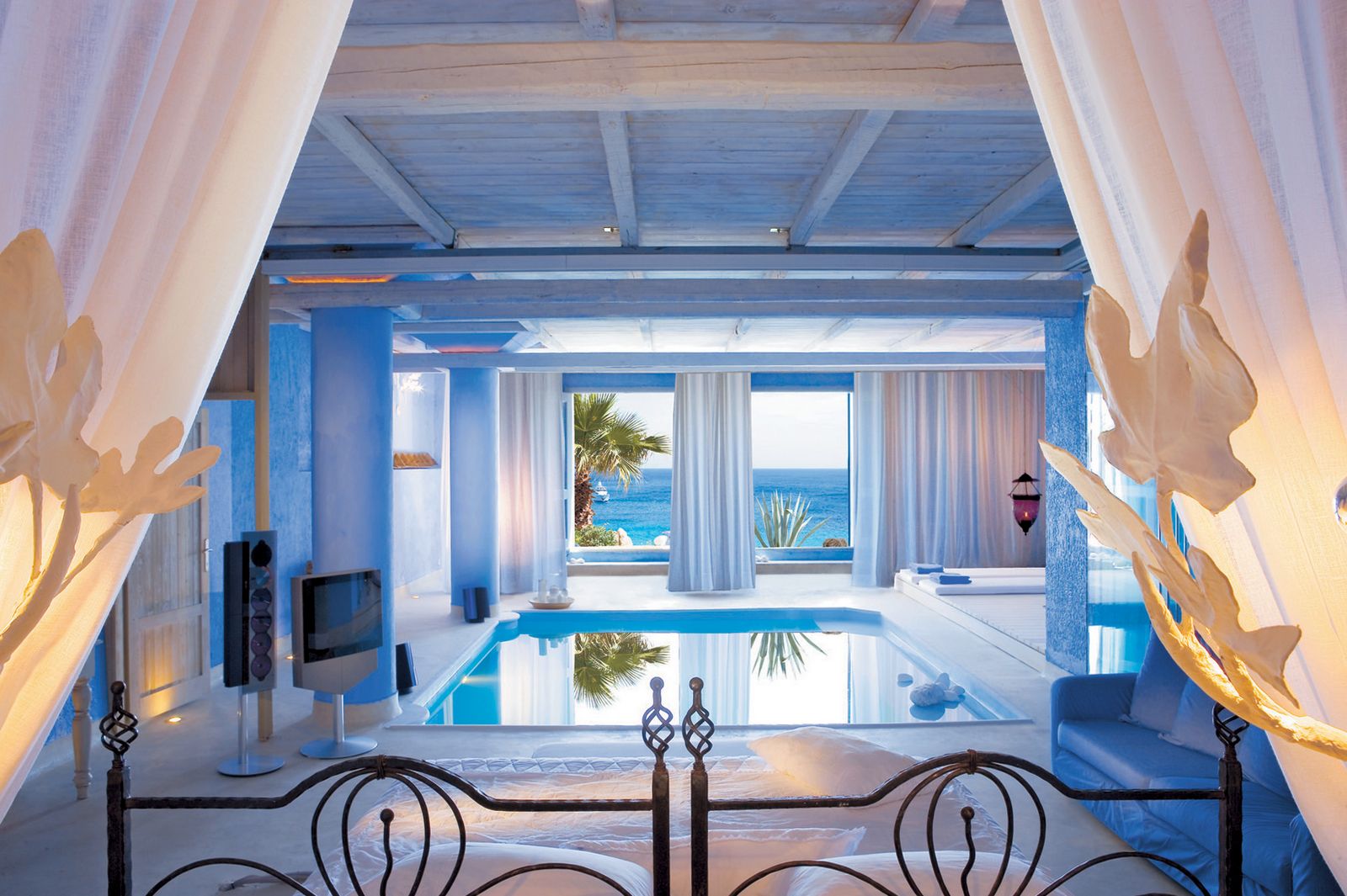 Bedroom with pool inside in Mykonos.